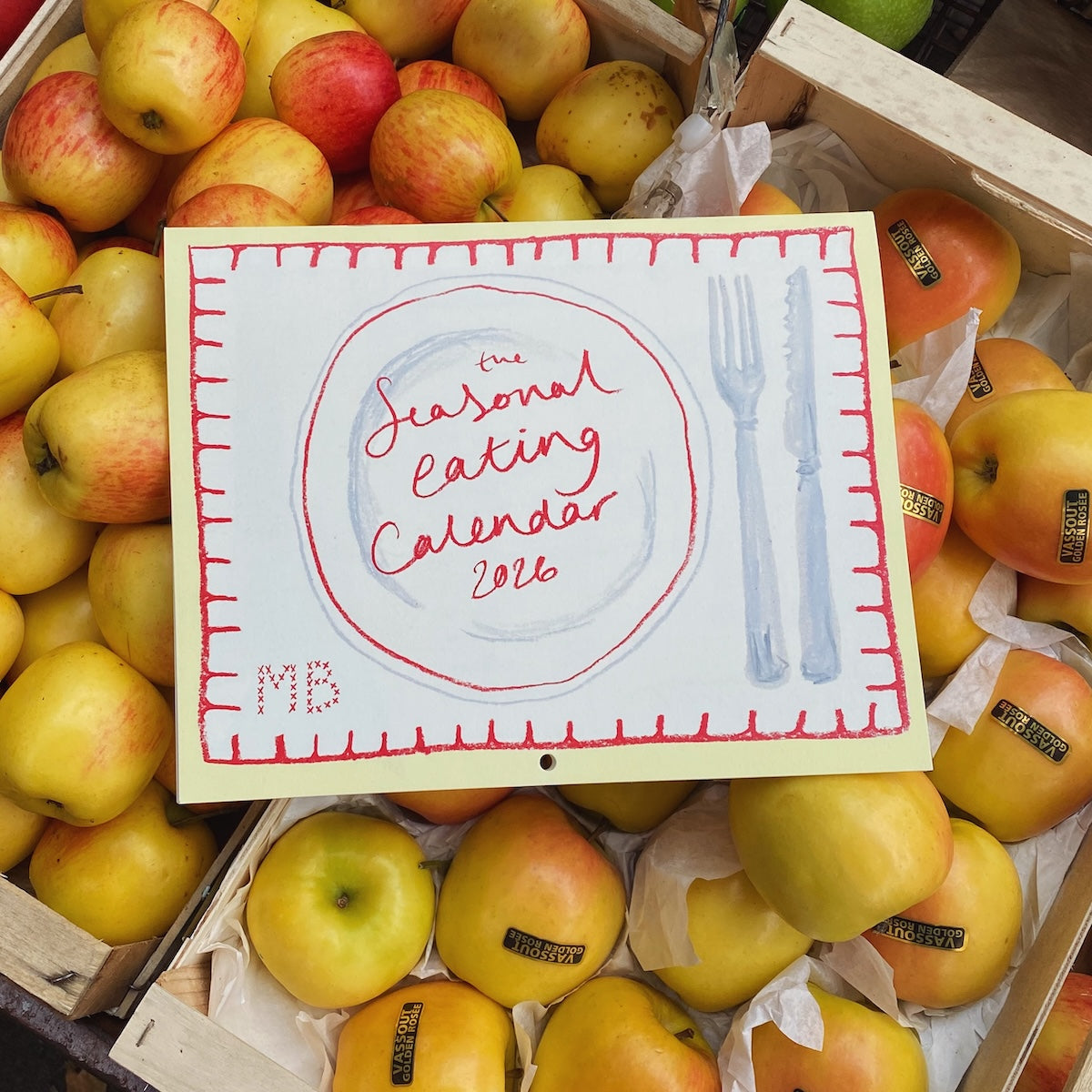 Seasonal eating calendar 2016 with apples in the background. Emma Cantley | Mainly Breakfast | Shop Fodder