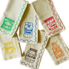 Set of fabric bags with embroidered designs on a white background. Embroidered Linen Napkins | See & Quin | Shop Fodder