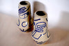 two Sophie Alda Rocket vases with hand painted decoration. 