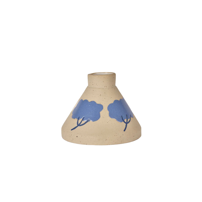 Ceramic vase with blue floral designs on a white background. Sophie Alda | Shop Fodder