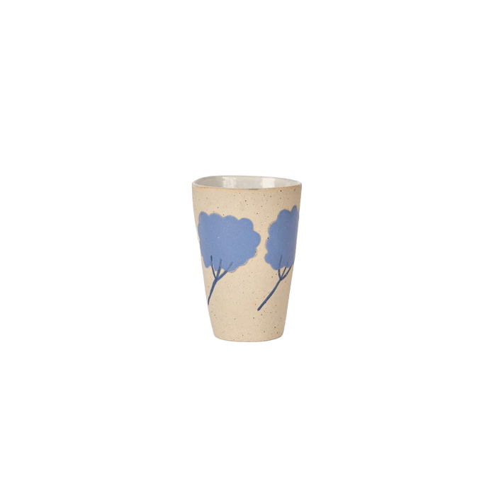 Beige cup with blue floral design on a white background. Sophie Alda Yarrow Cup | Fodder
