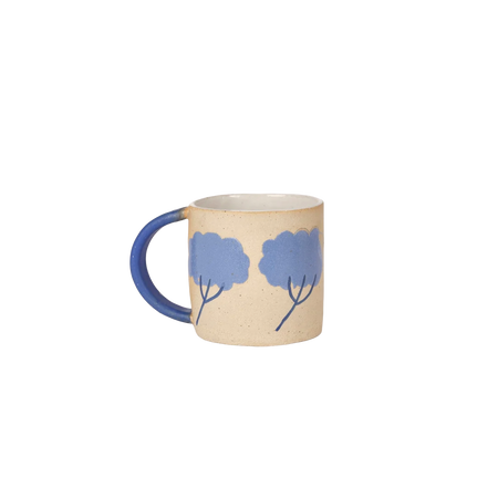 Mug with blue handle and floral design on a white background. Sophie Alda Yarrow Mug | Shop Fodder
