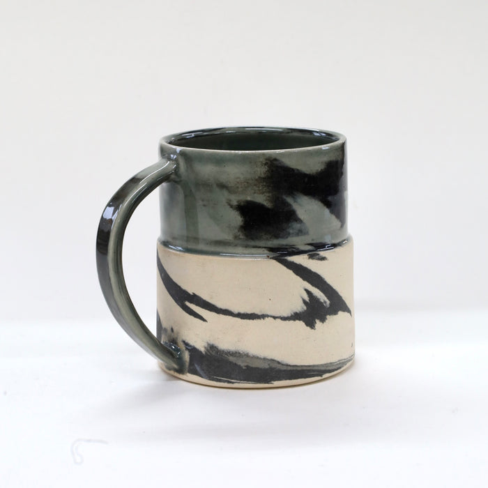 Black and white ceramic mug on a white background | Janne Meijer | shop Fodder