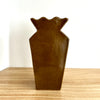 Honey ceramic vase on a wooden surface with a white background. Studio ERS | Ceramic Vase | Shop Fodder