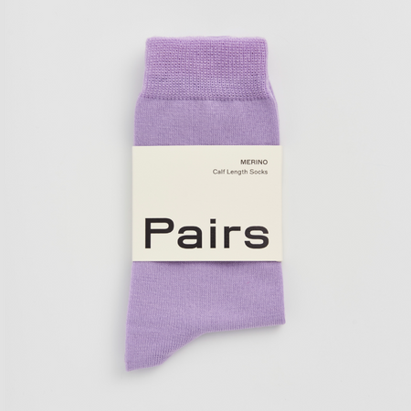 Purple sock with 'Pairs' label on a white background. Pairs Socks | Shop Fodder