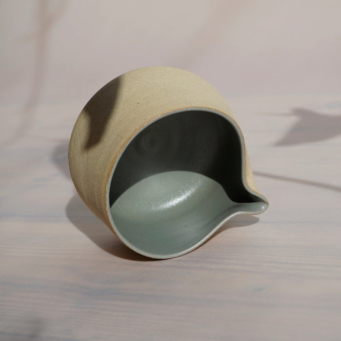 looking inside of a jug lying on its side. 