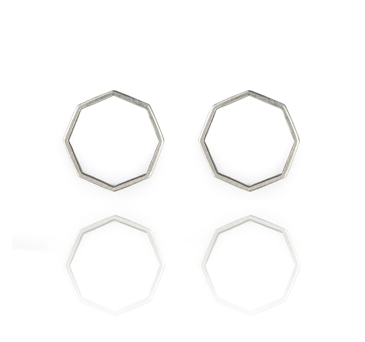 Set of four silver hexagonal rings on a white background | Everyday Silver Octagon Studs | Scarlett French | Fodder
