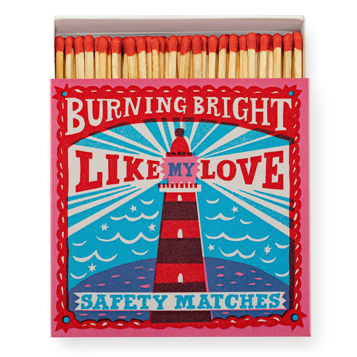 Matches box with a lighthouse design and text 'Burning bright like my love'. - Matches | Archivist Gallery | Shop Fodder